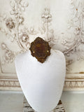 Aged jewelry Bust with Barn Wood Base and old metal finding on Top