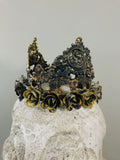 Metal crown with beautiful petite roses around the base of crown