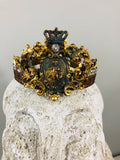 Crown with cherub medallion and small crown