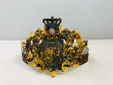 Crown with cherub medallion and small crown