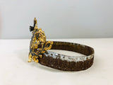 Crown with cherub medallion and small crown