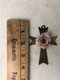 Metal cross with aged pink rose
