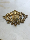 Metal Finding with cherub in center and 3 rhinestones