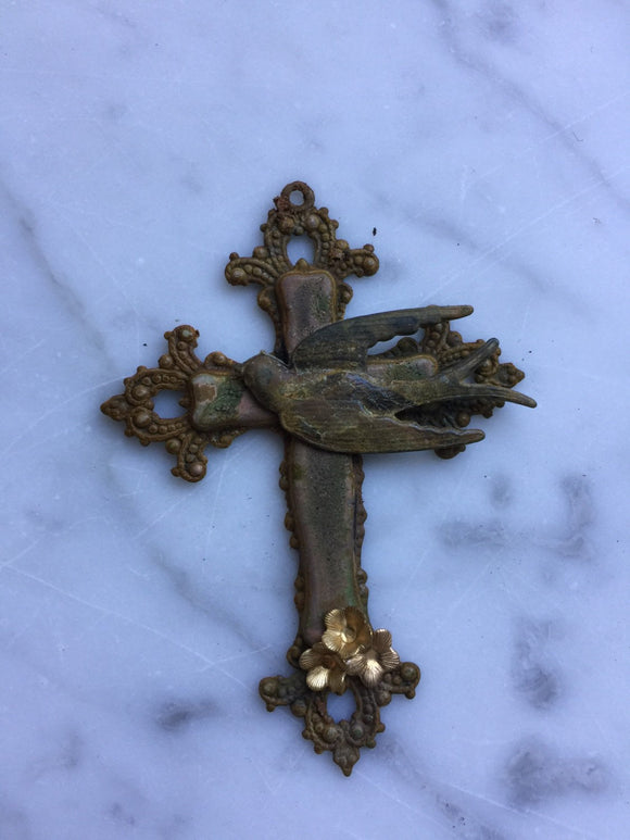 Metal cross with swallow and 3 gold flowers