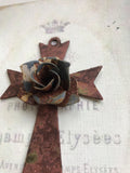 Metal cross with aged rose metal center