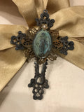 Metal cross with patina green Mary and small gold flower