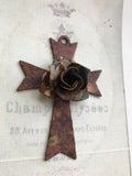 Metal cross with aged rose metal center