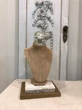 Burlap bust jewelry holder with vintage crystal knob and vintage barn wood base.