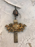 Metal cross with Mary center and beautiful flower drop hanging from top