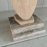 Burlap bust on barn wood stand with rose on top