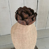 Burlap bust on barn wood stand with rose on top