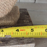 Burlap bust on barn wood stand with rose on top