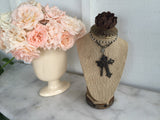 Burlap jewelry display with rusted rose top
