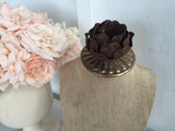 Burlap jewelry display with rusted rose top