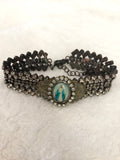 Rhinestone bracelet, embellished rhinestones and a mary pendant