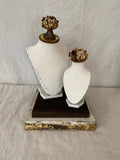 Bust set on old barn wood base with Milk paint washed busts with metal roses