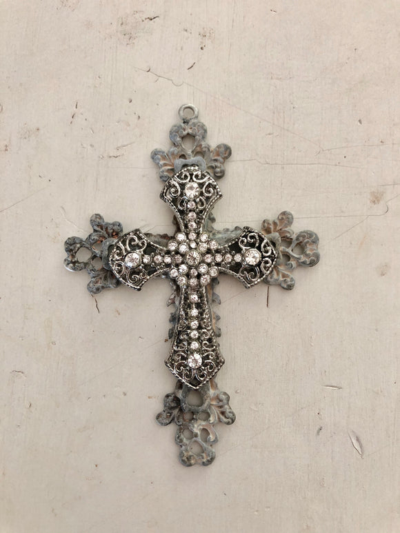 Metal cross layered with rhinestone cross