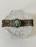 Rhinestone bracelet, embellished rhinestones and a mary pendant