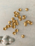 Beautiful small gold flowers 24 pieces