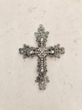 Metal cross layered with rhinestone cross