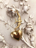 Gold heart pendant, 1 gold heart with swallow attached