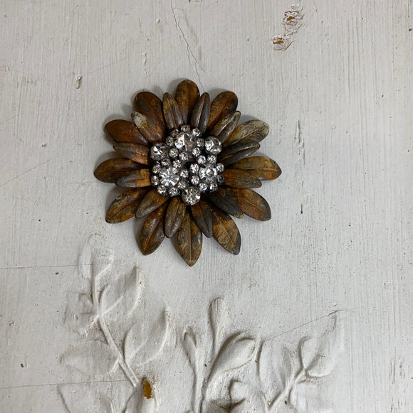 Daisy metal layered flower with a rhinestone cluster of flowers in the center