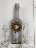 Daisy metal layered flower with a rhinestone cluster of flowers in the center